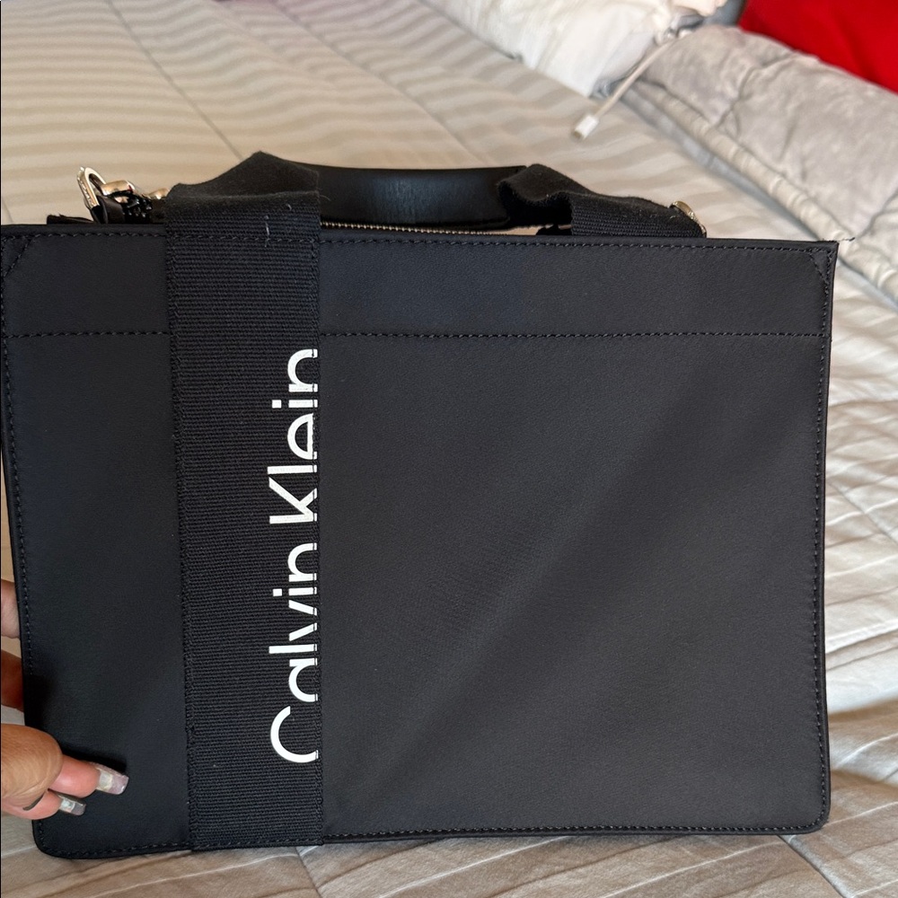 Handles and cross body strap that is removable